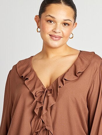 Blouse à volants et ouverture par liens