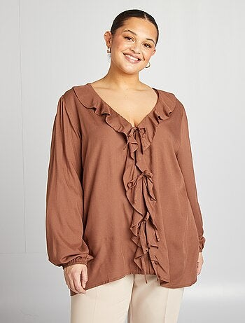 Blouse à volants et ouverture par liens