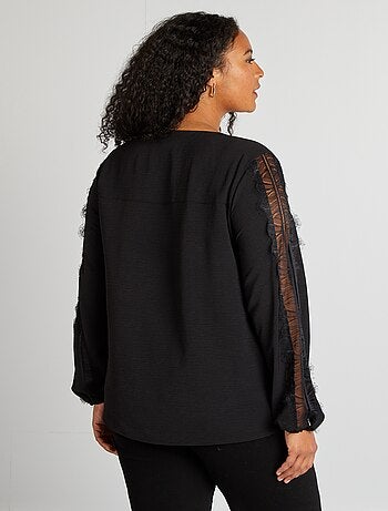 Blouse avec dentelles sur les manches