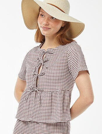 Blouse en matière crêpée avec ouverture à nouer