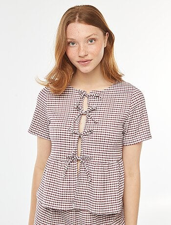 Blouse en matière crêpée avec ouverture à nouer