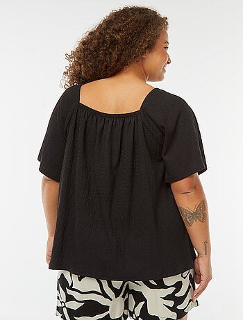 Blouse fluide encolure bardot en maille gaufrée