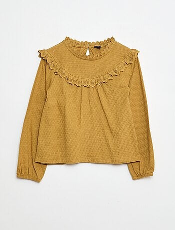 Blouse manches longues col rond avec plastron volanté avec broderies