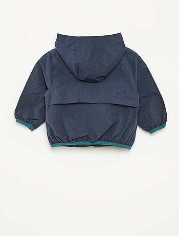 Blouson coupe-vent déperlant à capuche