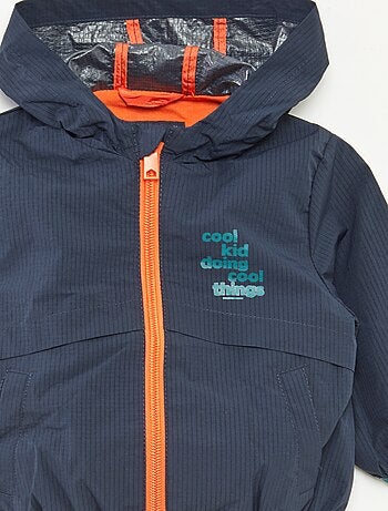 Blouson coupe-vent déperlant à capuche