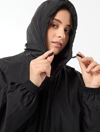 Blouson déperlant style coupe-vent à capuche