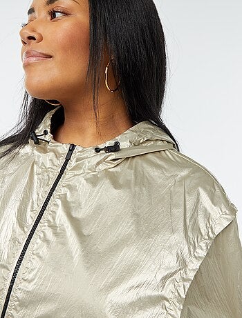 Blouson doré à capuche