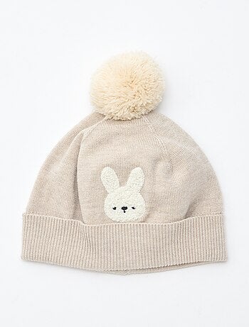 Bonnet maillé à pompon