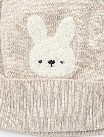 Bonnet maillé à pompon