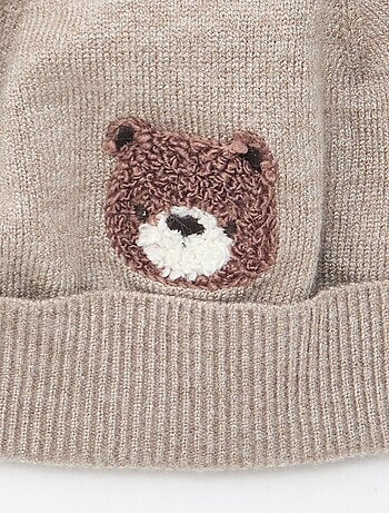 Bonnet maillé à pompon
