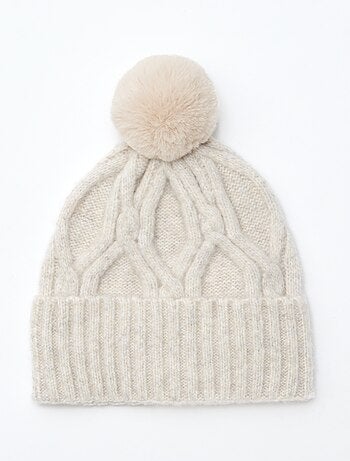 bonnet uni et côtelé avec pompon