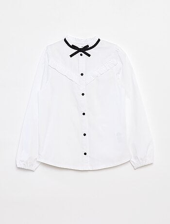 Chemisier avec volants et nœud fantaisie au col