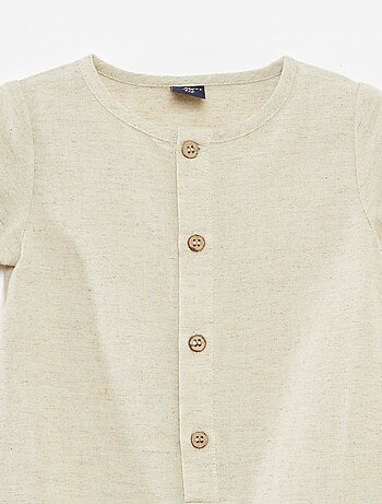 Combinaison courte avec ouverture boutonnée