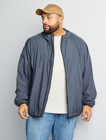 Coupe vent uni pliable dans la capuche
