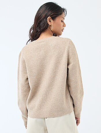 Gilet en maille avec boutons dorés