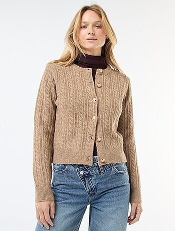 Gilet en maille torsade avec boutonnage doré