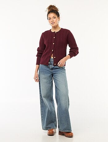 Gilet en maille torsade avec boutonnage doré