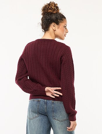 Gilet en maille torsade avec boutonnage doré