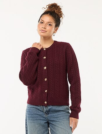 Gilet en maille torsade avec boutonnage doré