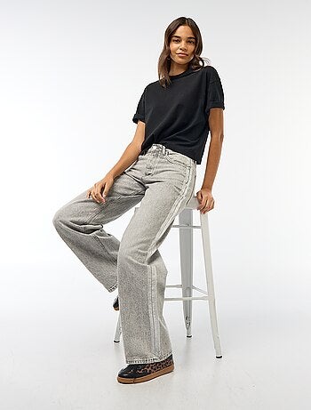 Jean baggy avec bandes argentées