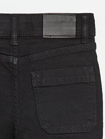 Jean coupe flare/bootcut avec poches plaquées