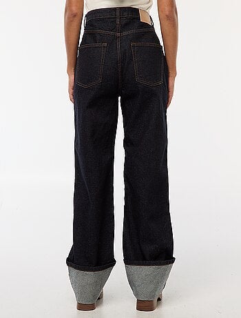Jean regular / taille haute avec large revers à la base