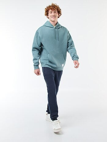 Jogging en molleton gratté avec 2 poches zippées