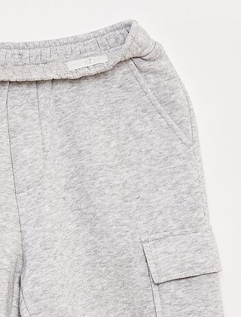 Jogging en molleton uni multi-poches