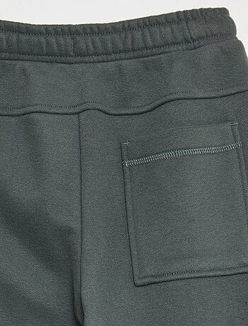 Jogging large avec bandes contrastantes