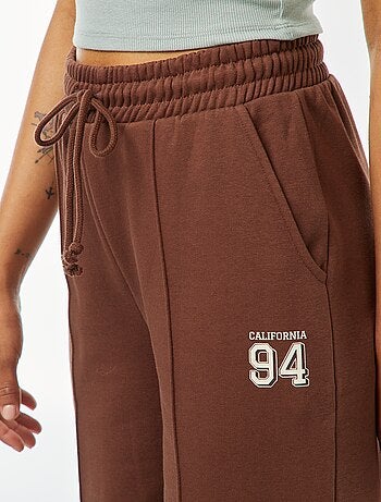 Jogging large avec imprimé sportswear