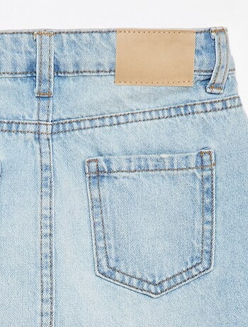 Jupe courte en denim unie coupe à cru