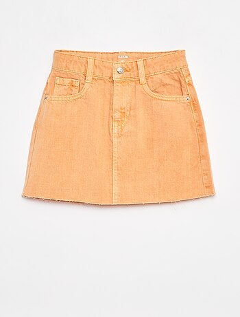 Jupe courte en denim unie coupe à cru
