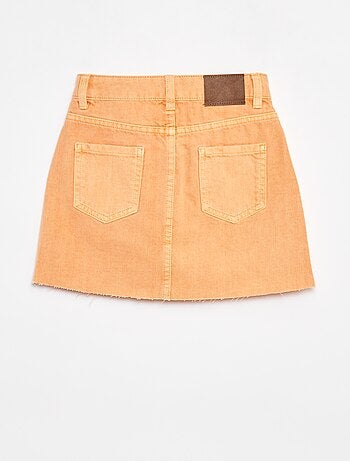 Jupe courte en denim unie coupe à cru