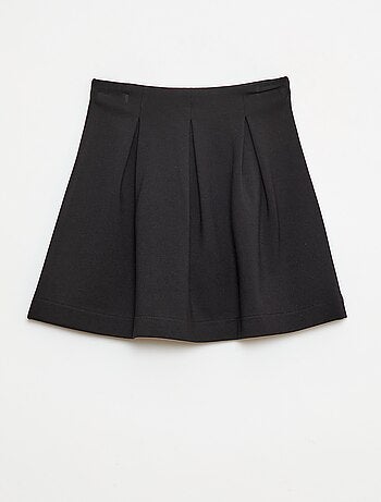 Jupe courte plissée unie