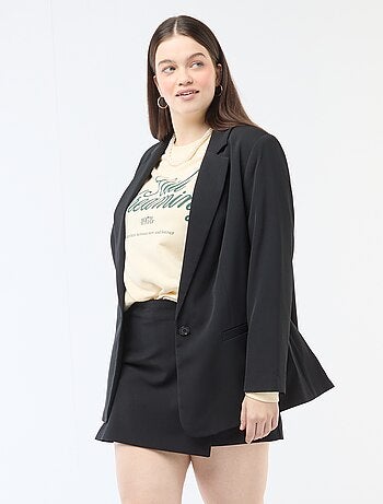 Jupe short avec pan croisé avec bouton fantaisie