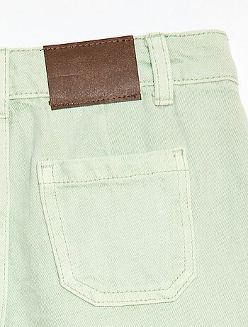 Jupe short en denim plissé