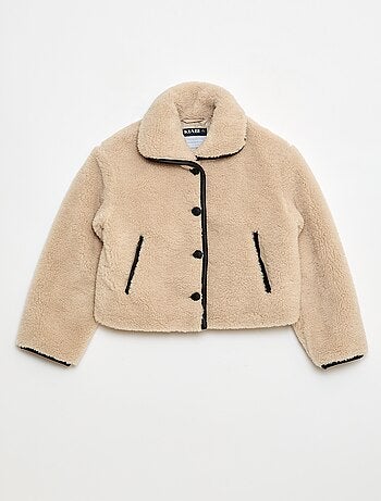 Manteau fausse fourrure avec ouverture pressionnée