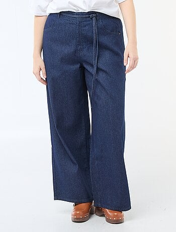 Pantalon denim / jean taille basse et coupe large