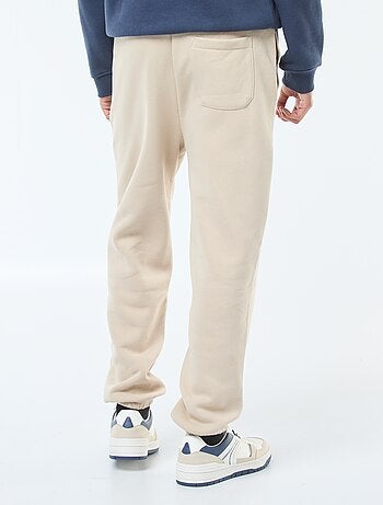 Pantalon jogging uni avec cordons de serrage à la taille