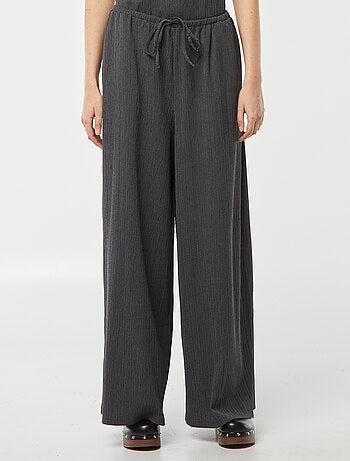 Pantalon large en maille plissée