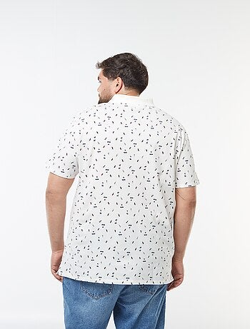 Polo à motifs en maille piquée