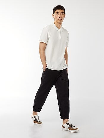 Polo en nid d'abeilles et col zippé