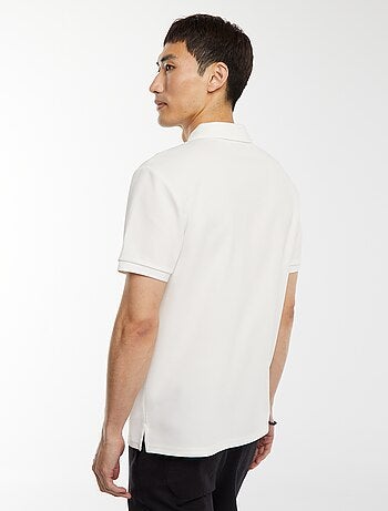 Polo en nid d'abeilles et col zippé