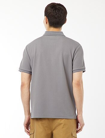 Polo en nid d'abeilles et col zippé