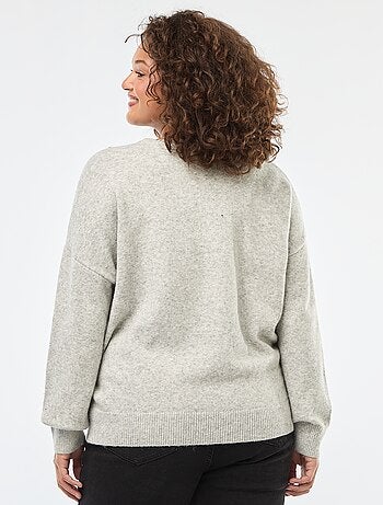 Pull avec col cache-cœur et strass fantaisies