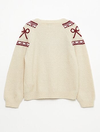 Pull col rond avec motif de noeuds