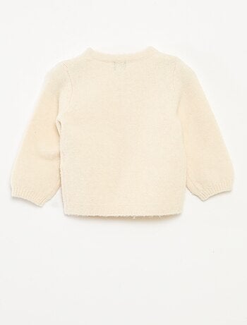 Pull col rond avec patch fleurs