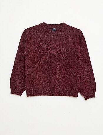 Pull en maille avec nœud en maille torsade devant
