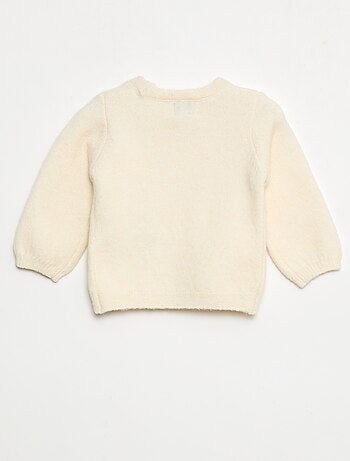 Pull en maille avec nœud fantaisie devant