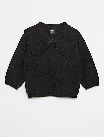 Pull en maille avec un large nœud fantaisie devant